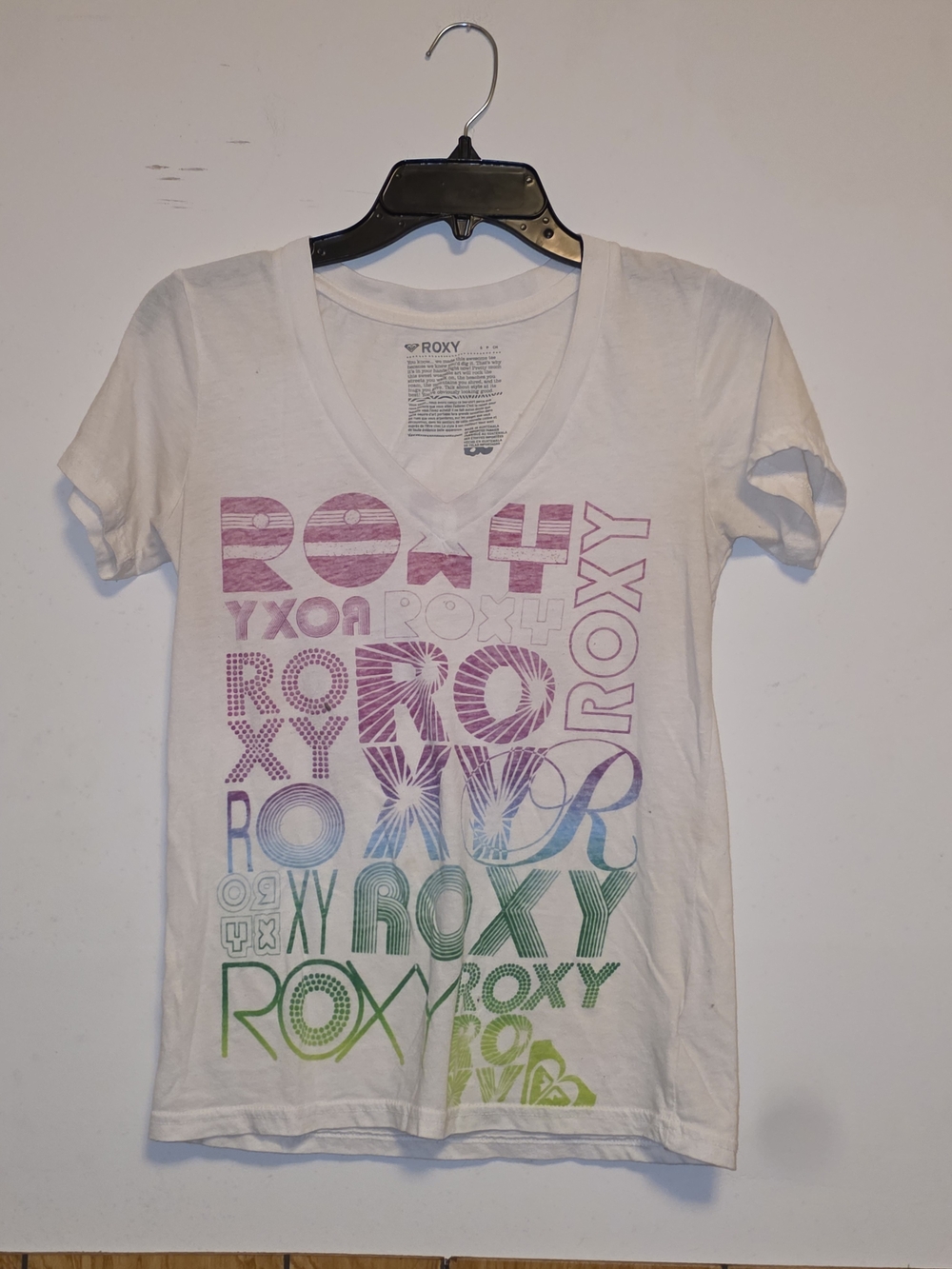 Roxy White V-Neck Tee with Pink-Purple-Blue-Green Gradient Logo